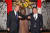 24일 왕이(왼쪽) 중국 외교부장과 모테기 도시미쓰 일본 외무상이 회담 전 팔꿈치 인사를 하고 있다. [중국 외교부 제공]