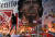 마라도나의 벽화가 그려진 장소에서 소년 축구팬이 고인을 추모하고 있다. [로이터=연합뉴스]