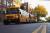 뉴욕 브루클린 근처에 세워져 있는 스쿨버스들. [AFP=연합뉴스]