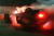 1일 오후 10시 46분 부산 강서구 명지동 강서경찰서 인근 도로에서 전복된 차량에 불이 붙어 있는 모습. 사진 부산경찰청