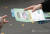  지난달 13일 오전 서울 중구 삼성본관빌딩 앞에서 서울시 관계자들이 올바른 마스크 착용 안내 캠페인을 벌이고 있다. 연합뉴스