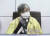 정은경 질병관리청장이 8일 오후 서울 중구 서울시청에서 영상으로 열린 '수도권 코로나19 상황점검회의'에 오른쪽 어깨를 깁스한 채 참석해 자리에 앉아 있다. 뉴스1