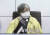 정은경 질병관리청장이 8일 오후 서울 중구 서울시청에서 영상으로 열린 '수도권 코로나19 상황점검회의'에 오른쪽 어깨를 깁스한 채 참석해 자리에 앉아 있다. 뉴스1
