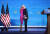 대통령 당선인 조 바이든이 14일 델라웨어 윌밍턴에서 선거인단 선거 결과에 대해 연설한 뒤 부인 질 여사와 포옹하고 있다. AFP=연합뉴스