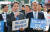 2015년 김경협 당시 새정치민주연합(민주당 전신) 의원이 부천역 광장에서 문재인 대통령(당시 대표)와 함께 국정교과서 반대를 호소하고 있다. 뉴스1