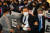 더불어민주당 정청래 의원이 10일 오후 국회 본회의장 앞에서 손피켓을 들고 시위하는 국민의힘 의원들과 말다툼을 하자 의원들이 말리고 있다. 연합뉴스