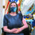 낸시 펠로시 미국 하원의장이 18일(현지시간) 워싱턴 국회의사당에 있는 사무실에서 의회 주치의 브라이언 모나한으로부터 코로나19 화이자 백신을 맞고 있다. [UPI=연합뉴스]