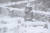 제주도 산간에 대설경보가 내려진 30일 오전 제주시의 한 중산간도로변에 세워진 돌하르방이 하얀 눈을 뒤집어 쓰고 있다. 연합뉴스