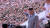 김정은 북한 국무위원장이 지난해 10월 11일 노동당 창건 75주년 기념 집단체조를 관람하고, 열병식 참가자 및 경축대표와 기념사진을 촬영했다. [조선중앙TV 화면=연합뉴스]