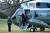 도널드 트럼프 전 미국 대통령이 지난 20일(현지시간) 마린원을 타고 백악관을 떠나고 있다. [AFP=연합뉴스]