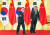 문재인 대통령이 지난해 2월 23일 중국 베이징 인민대회당에서 시진핑 중국 국가주석과 정상회담에 앞서 기념촬영을 한 뒤 회담장으로 이동하고 있다. [청와대사진기자단]