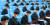 3일 평양에서 열린 북한의 김일성-김정일주의청년동맹 전원회의 참석자들이 마스크를 쓰고, 한 칸씩 띄어 앉은 거리두기를 하며 회의를 하고 있다. [뉴스1]