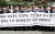 지난해 6월 개성공단 입주기업들이 서울 종로구 정부서울청사 앞에서 열린 '대북전단 살포 금지 및 4대 공동선언 비준 동의 촉구 긴급 기자회견'에서 대북 전단(삐라) 살포 금지를 촉구하고 있다. [뉴스1]