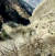 7일(현지시간) 인도 북부 히말라야산맥의 난다데비산에서 빙하가 떨어지면서 댐을 강타해 급류가 쏟아져내리고 있다. . 로이터=연합뉴스