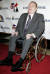 래리 플린트는 장애를 입은 뒤 금도금 한 휠체어를 타고 다녔다. 2007년 촬영된 사진이다. AP=연합뉴스 