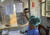 지난 11일 첫번째 에볼라 사망자가 나온 부템보의 병원에서 체온을 재는 모습. AP=연합뉴스