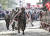 15일 미얀마 양곤에서 군인들이 반군부 시위대 앞에 바리케이드를 설치하고 있다. [EPA=연합뉴스]