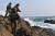 육군 초등조치부대원들이 해안에서 원인미상의 물체 발견에 따른 수색·경계 훈련을 하고 있다. [육군]