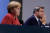 독일 앙겔라 메르켈 총리(왼쪽)와 기독사회연합(CSU)의 당수 마커스 죄더 독일 바이에른주 총리. AFP=연합뉴스