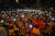 지난 13일(현지시간) 미얀마 양곤에서 군부 쿠데타에 반대하는 이들이 휴대전화 불빛을 밝히며 시위를 벌이고 있다. [AFP=연합뉴스]