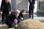 지난 16일 광주광역시 북구 운정동 국립5·18민주묘지에 마련된 희생자 박병현씨 묘소 앞에서 당시 계엄군 A씨가 참배하고 있다. 사진 5·18진상규명조사위원회