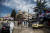 지난 2020년 3월 24일 코로나19가 막 유행하기 시작한 시리아의 수도 다마스쿠스의 거리에 바샤르 알아사드 대통령의 사진이 여기저기 걸려있다. AP=연합뉴스 