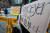 지난 17일 서울 종로구 옛 일본대사관 앞에서 열린 '일본군성노예제 문제해결을 위한 제1483차 정기 수요시위'에서 한 시민이 일본군 위안부 역사를 왜곡한 램지어 교수를 규탄하는 피켓을 들고 있다. 뉴스1