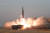 북한이 지난 25일 새로 개발한 신형전술유도탄 시험발사를 진행했다며 탄도미사일 발사를 공식 확인했다. [조선중앙TV 화면캡쳐]
