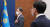문재인 대통령이 19일 청와대에서 열린 제3회 국무회의에서 국민의례를 하고 있다. 오른쪽은 김상조 정책실장. 청와대사진기자단