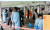 5일 서울 중구 서울역광장에 마련된 신종 코로나바이러스 감염증(코로나19) 임시선별진료소에서 시민들이 검사를 기다리고 있다. 뉴스1