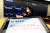 14일 오전 서울 강남구 암호화폐 거래소 업비트 라운지에 설치된 테블릿에 비트코인 가격이 표시되고 있다. [뉴스1]