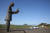 알뜨르 비행장 어귀 주차장에 설치된 최평곤 작가의 조형물 ‘파랑새’. 대나무를 이용해 소녀가 파랑새를 안고 있는 모습을 형상화했다. 높이가 무려 9m에 이른다.
