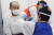 지난 14일(현지시간) 일본 나고야 지역의 고령층 우선 접종 대상자가 코로나19 백신을 접종하고 있다.[AP=연합뉴스]
