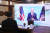 문재인 대통령이 22일 청와대 상춘재에서 화상으로 열린 기후정상회의에 참석, 조 바이든 미국 대통령 발언을 듣고 있다. 연합뉴스