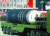 지난해 10월 노동당 창건 75주년 기념 열병식에서 공개된 발사관 6개(6연장)의 신형 잠수함 발사 탄도 미사일(SLBM). 신형 SLBM 동체에 ‘북극성-4A’로 추정되는 글씨가 찍혀있다. [연합뉴스]