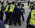지난 24일 서울 종로구 일본대사관 앞에서 일본의 방사능 오염수 방류 문제에 항의하는 시민단체 회원을 경찰이 제지하고 있다. [중앙포토]