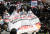 한국대학생진보연합 소속 회원들이 지난 20일 오후 서울 종로구 주한 일본대사관 앞에서 일본 정부의 후쿠시마 원전 오염수 방류 결정을 규탄하며 집단 삭발을 하고 있다. 뉴스1