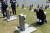 지난달 21일 오전 광주 북구 운정동 국립 5·18민주묘지에서 노태우 전 대통령의 아들 재헌씨가 희쟁자들의 묘역을 참배하고 있다. 사진 국립 5·18 민주묘지