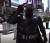 18일(현지시간) 미국 뉴욕 타임스퀘어에서 배트맨 분장을 하고 관광객들과 사진을 찍어주던 패트리샤 라미스는 ″이제 안전한 뉴욕으로 오라″고 말했다. [이광조 기자]