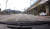 지난 29일 오전 강원 춘천시 퇴계동의 한 인도를 달리는 승용차. [사진 독자제공]