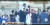 일본 방송 ANN이 공개한 영상 속에서 만찬에 참석한 문재인 대통령(파란 원)이 스가 총리(빨간 원)와 인사를 나누는 모습. [사진 ANN 방송화면 캡처]
