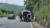 지난 13일 쇠줄이 허리에 묶힌 상태의 변사체가 발견된 충남 청양군의 한 저수지에서 경찰 과학수사요원이 수색작업을 벌이고 있다. 신진호 기자