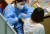 신종 코로나바이러스 감염증(코로나19) 확산속에 예방 접종이 실시된 24일 대전의 한 예방접종센터에서 의료진이 시민들에게 화이자 백신을 신중히 접종하고 있다. 프리랜서 김성태