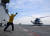 지난달 21일 거제도 인근 해상 경찰청 헬기(KUH-1P/앞) 및 해양경찰청 헬기(S-92/뒤)가 함상 이착함 자격(DLQ) 유지를 위해 해군 독도함 비행갑판에 이·착함 훈련을 하고 있다. 사진 (해군