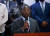 클로드 조제프 아이티 임시 총리가 8일 대통령 암살 용의자들이 언론에 공개관련 기자회견을 갖고 있다. [로이터=연합뉴스]