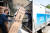 경기도 수원시 영통구에 위치한 삼성전자로지텍 수원센터 물류창고에서 담당자들이 삼성 '비스포크 무풍에어컨'을 배송하기 위해 차량에 싣고 있다. [사진 삼성전자]