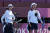 24일 일본 도쿄 유메노시마 공원 양궁장에서 열린 2020 도쿄올림픽 혼성단체전 경기를 소화하고 있는 한국 대표팀의 안산(왼쪽)과 김제덕. [뉴스1]