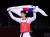 24일 일본 마쿠하리 메세 A홀에서 열린 도쿄올림픽 남자 태권도 58㎏급 경기에서 동메달을 획득한 장준이 태극기를 들고 세리머니를 하고 있다.[연합뉴스]