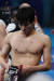 27일 일본 도쿄 아쿠아틱스센터에서 열린 도쿄 올림픽 수영 남자 자유형 200m 결승전에서 황선우가 메달 획득에 실패한 뒤 아쉬운 표정으로 경기장을 나가고 있다. [연합뉴스]