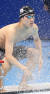 27일 일본 도쿄 아쿠아틱스 센터에서 열린 남자 자유형 200m 결승에 출전한 한국 황선우가 경기 전 물을 뿌리고 있다. [연합뉴스]
